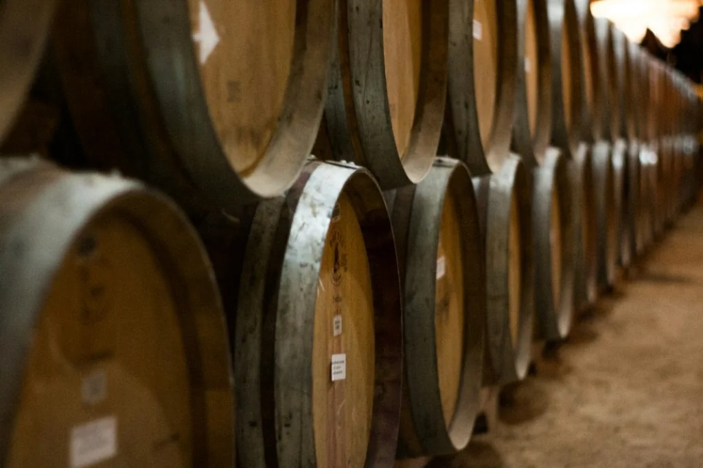 Wine barrels ageing in a cellar
